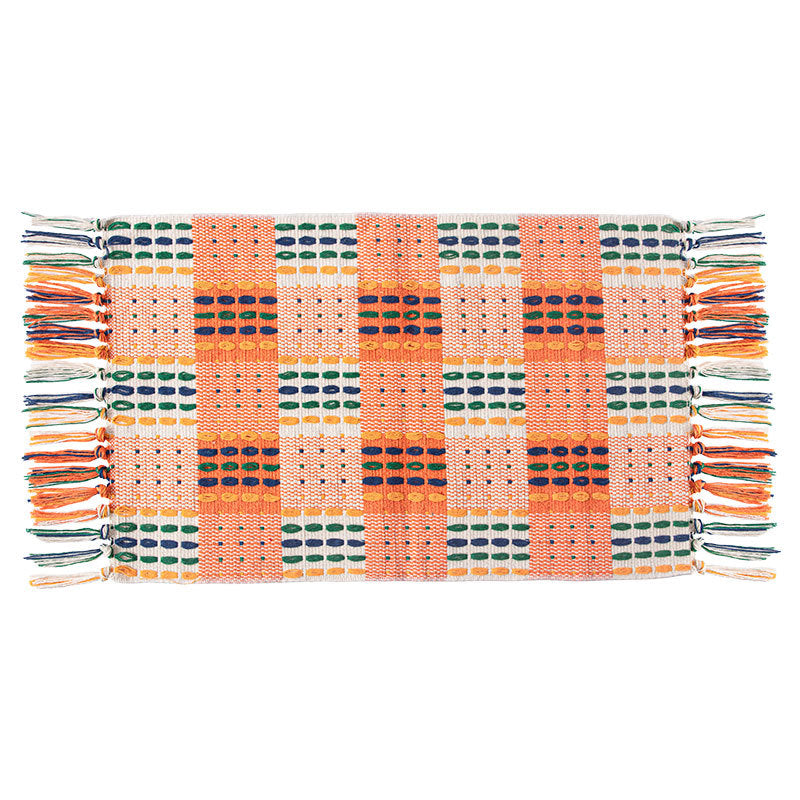 Woven colorful table runner with fringes and checkered structure