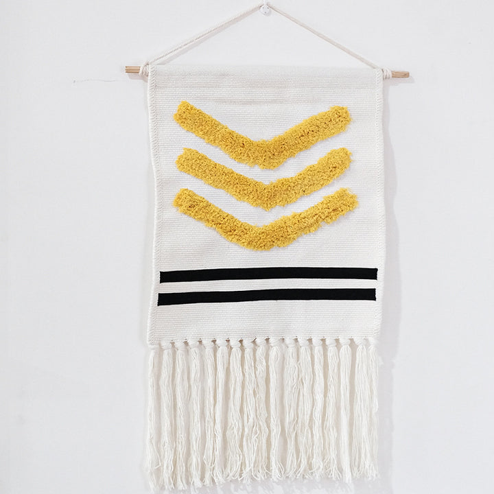 Hand-woven wall hanging and table runner made of cotton blend with geometric staircase pattern and long fringes
