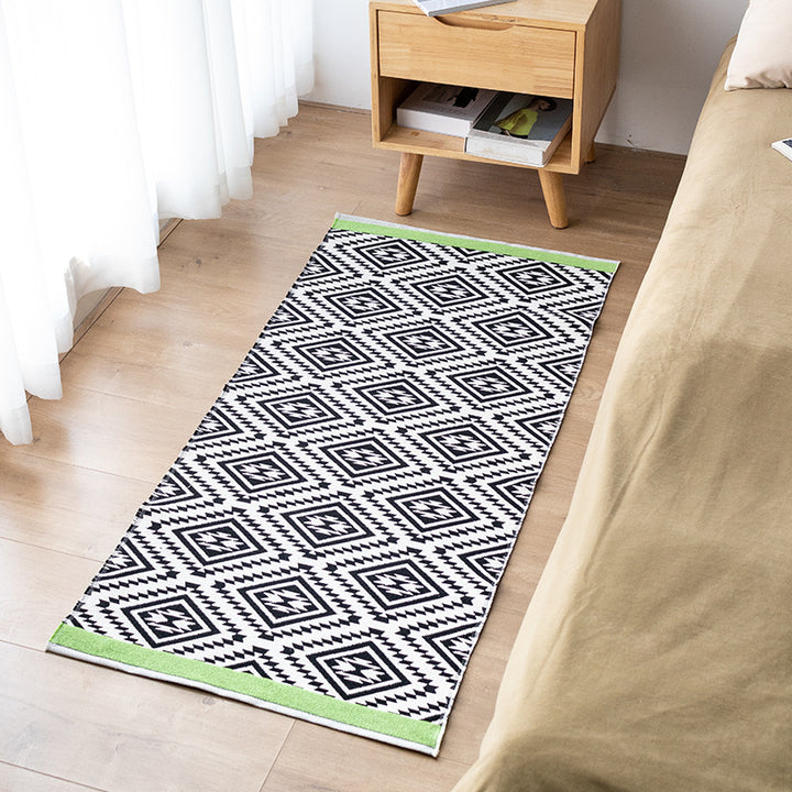 Flat-woven kitchen runner with modern striped pattern and easy-care cotton blend