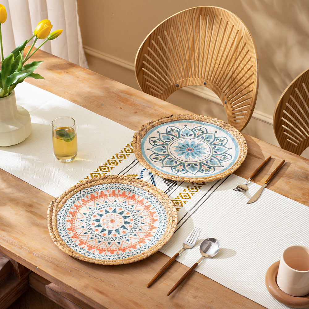 Round woven table mat made of jute with mandala cotton overlay