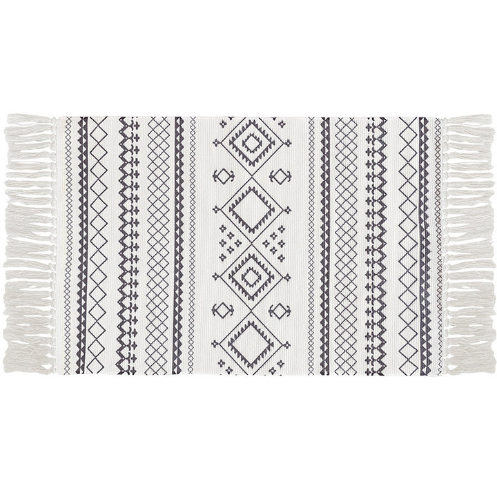 Flat-woven cotton carpet runner with ethnic diamond pattern and decorative fringes