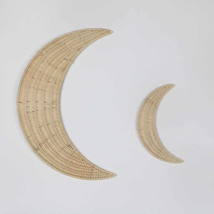 Wall decoration made of handwoven rattan in moon design