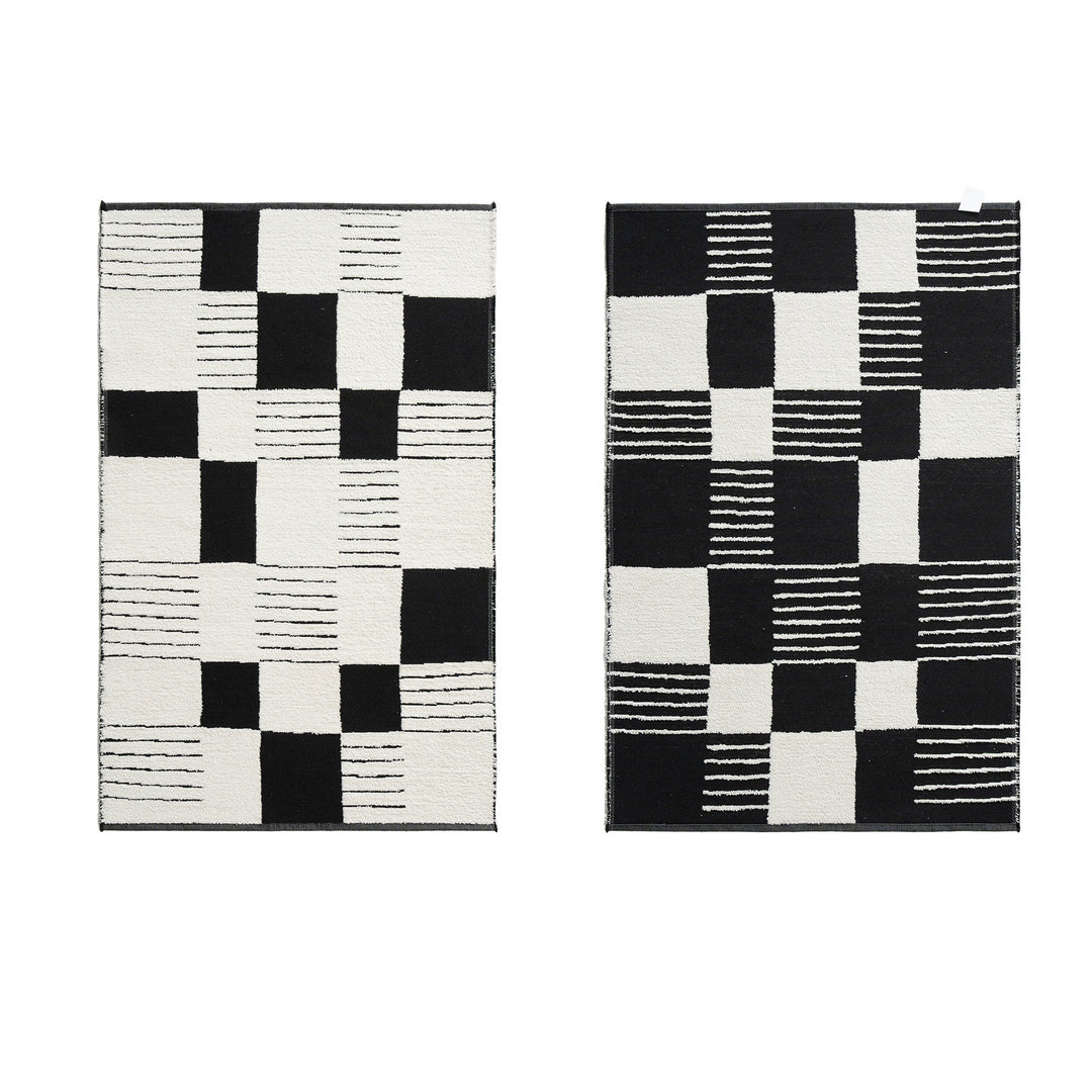 Modern runner rug with graphic checkerboard pattern and short pile structure
