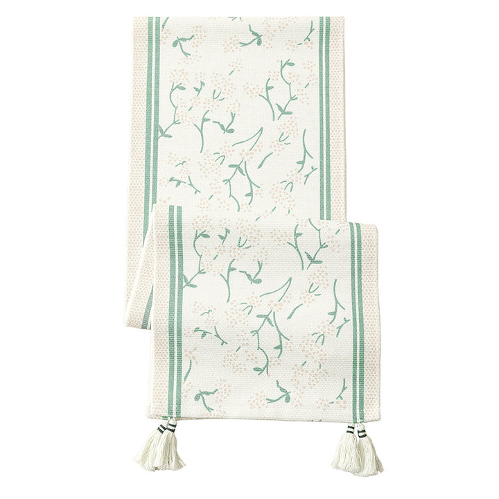 decorative table runner made of woven cotton with tassels