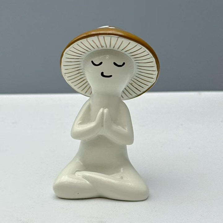 Decorative figure of a meditating mushroom