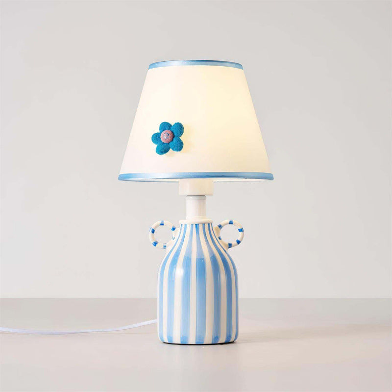 Decorative table lamp with floral detail
