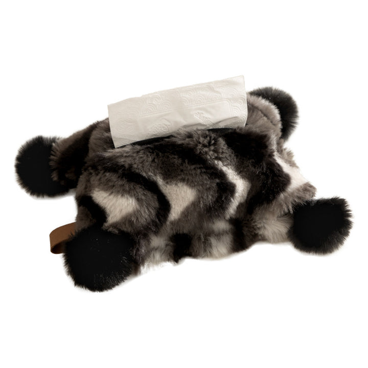 Cozy tissue box cover made of artificial fur with pom-pom application