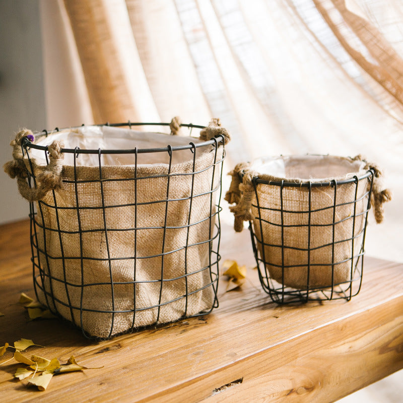 Decorative storage basket made of wire and linen