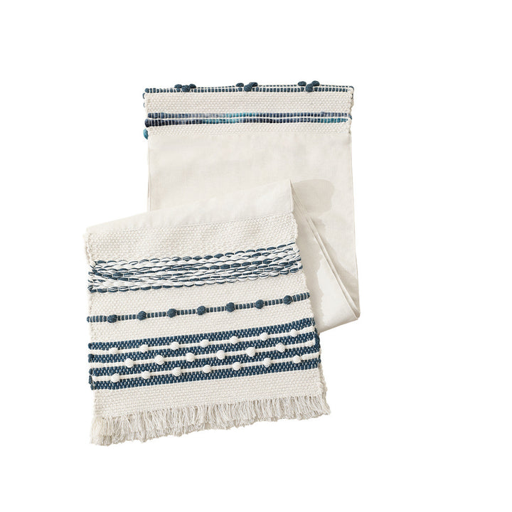 Woven cotton table runner with fringes and textured pattern