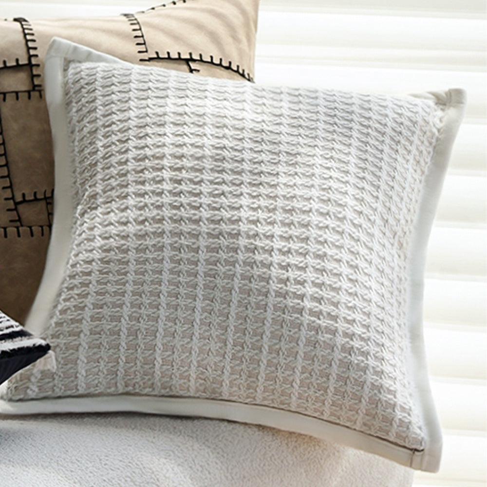 Woven home decor pillow cover with fine striped texture and hand-fringed edge