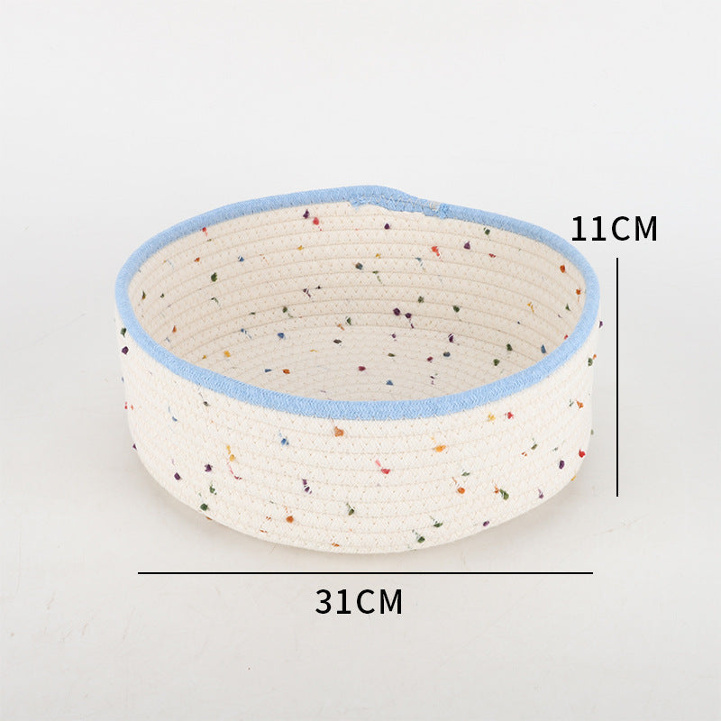 Storage basket made of natural cotton fabric with colorful dots