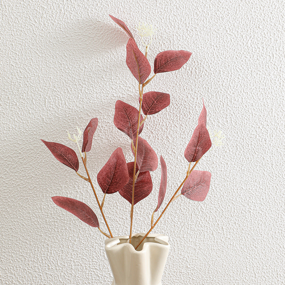 Decorative artificial flower branch with delicate leaves