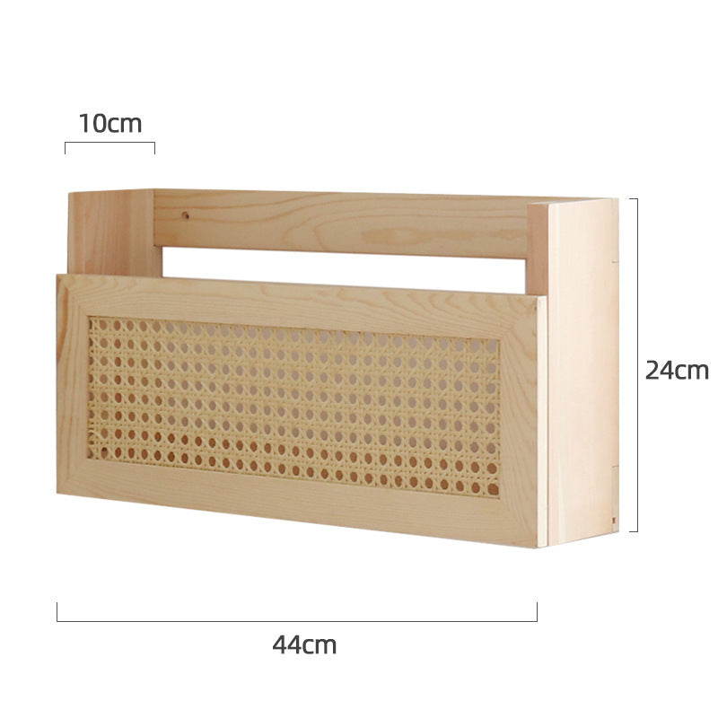 Wall shelf made of untreated wood with rattan inserts