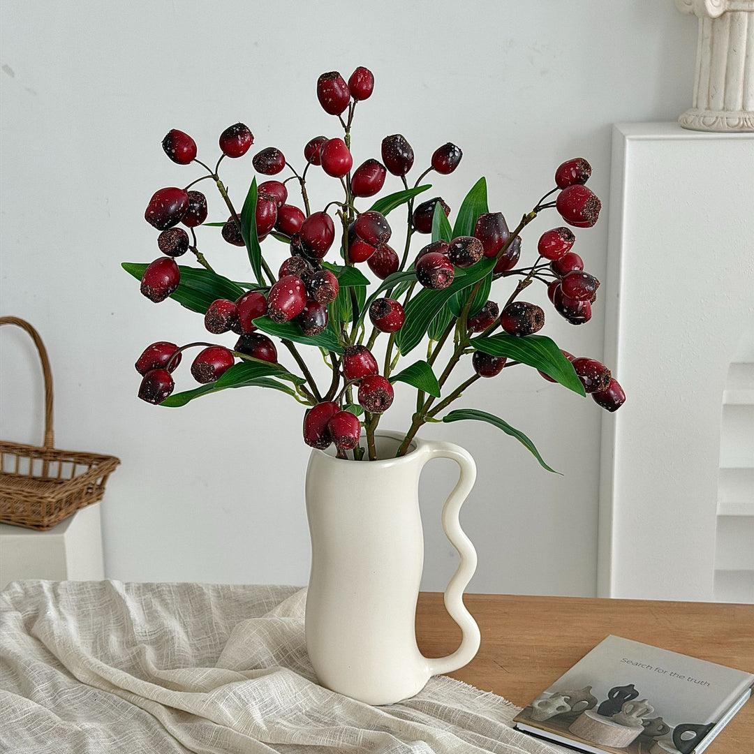 Artificial branch with olives