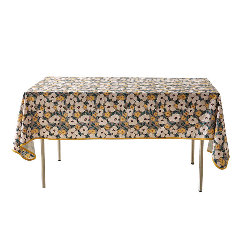 Coated tablecloth in country house style with botanical print and fine hem