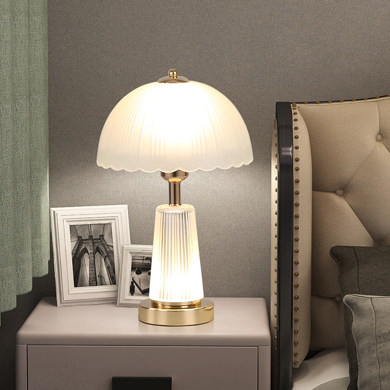 Elegant table lamp with hand-crafted flame-like shade