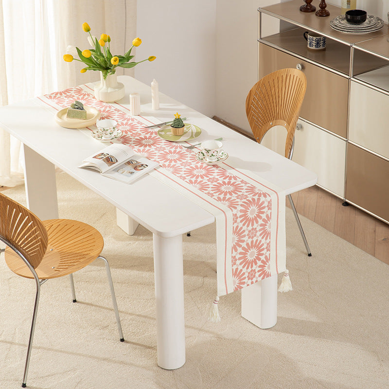 Web table runner made of cotton blend with woven diamond design and tassels