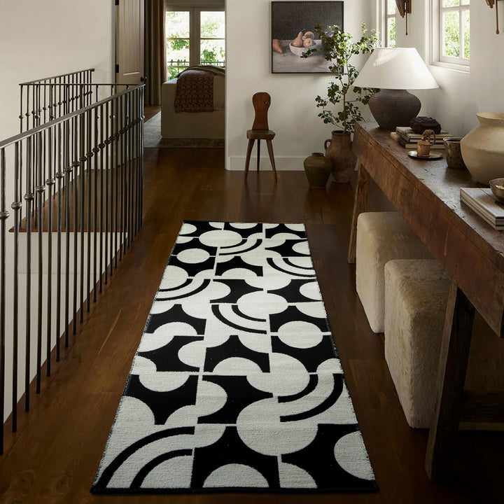 Modern runner rug with graphic checkerboard pattern and short pile structure