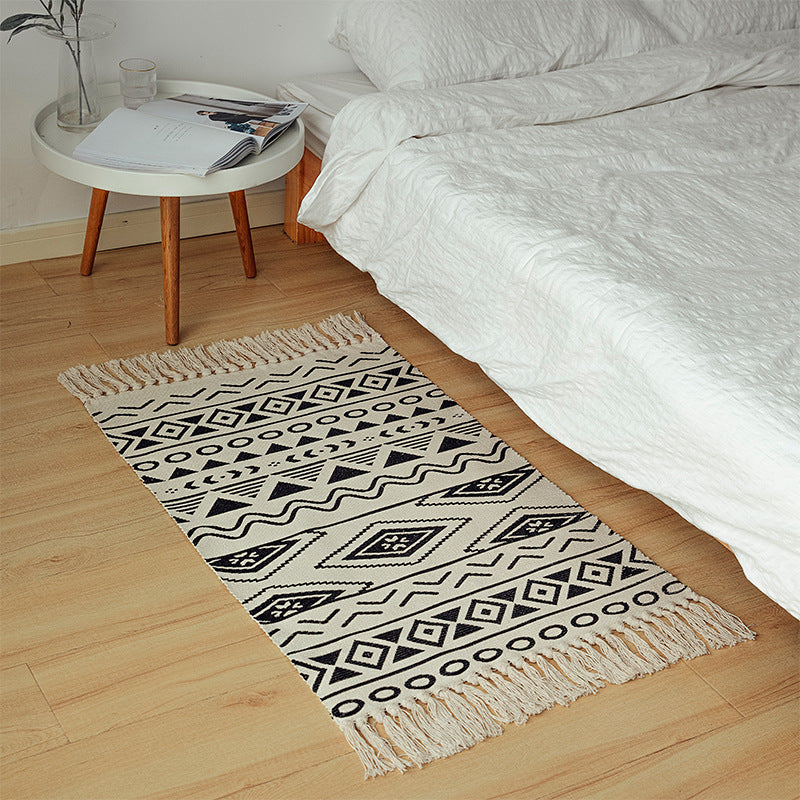 Flat-woven cotton runner in Boho-Tribal design with geometric diamond patterns and hand-fringed edge