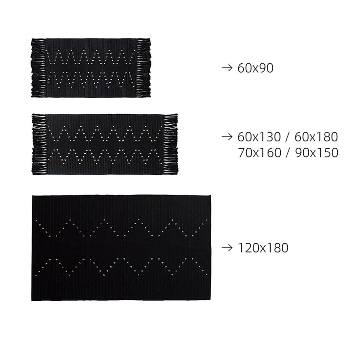 handwoven living room rug with fringes and geometric perforated pattern
