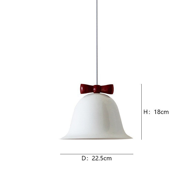 Bell-shaped ceramic pendant light with decorative bow accent