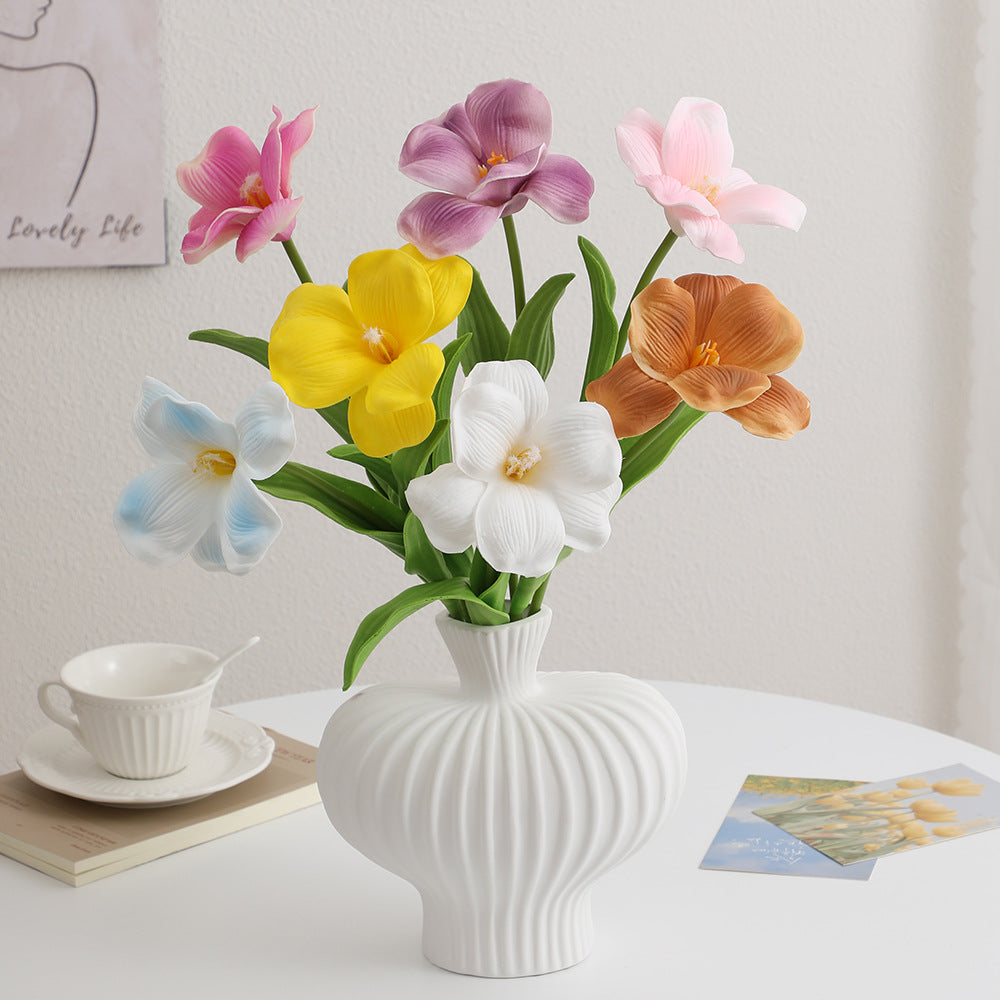 Artificial orchid flower branch with realistic details