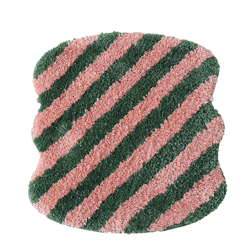 High-pile bath mat rug with diagonal stripe structure and organic shape