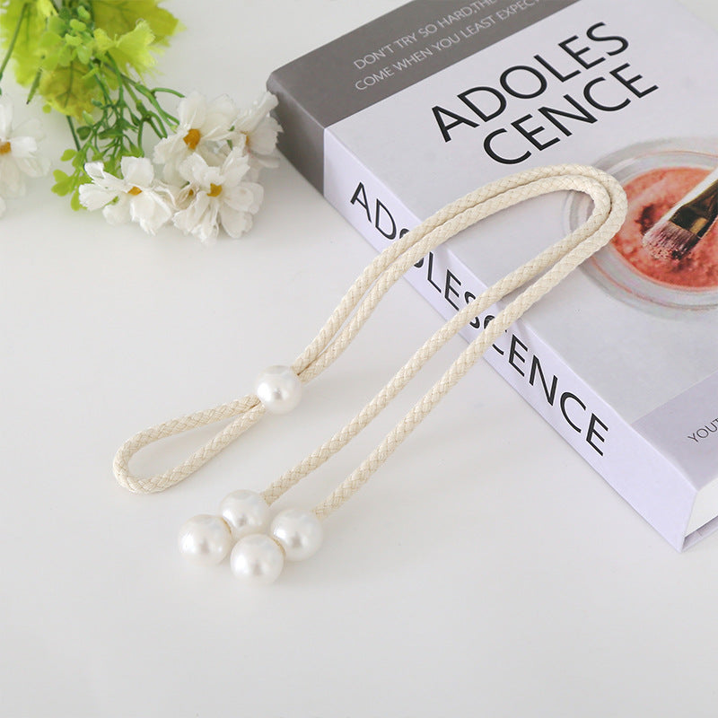 Elegant curtain tieback with pearl trim