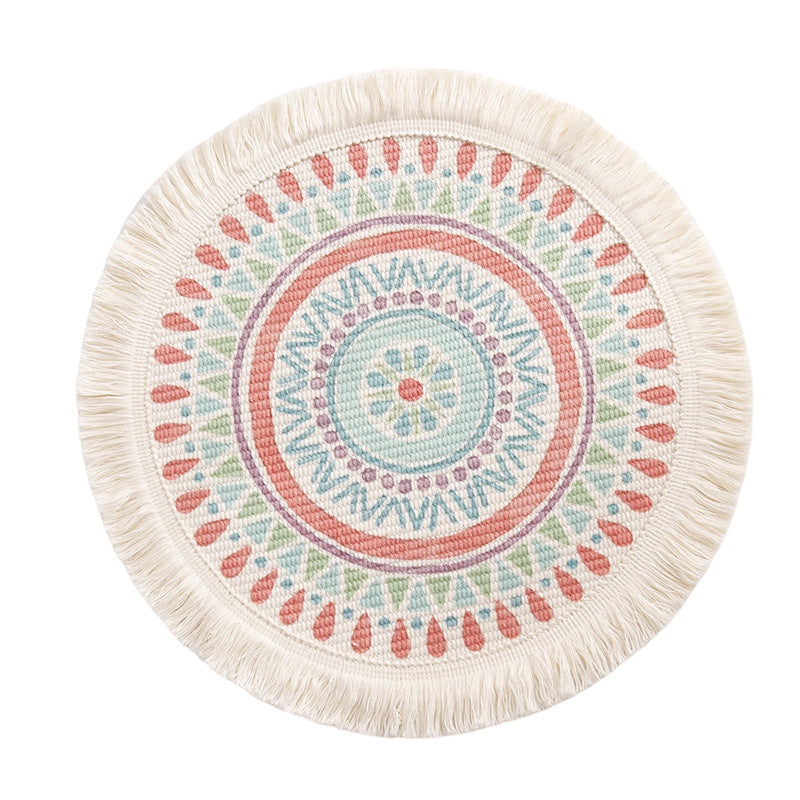 Round flat-woven cotton rug with mandala design and decorative fringes