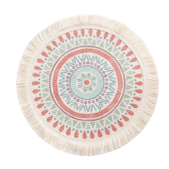 Round flat-woven cotton rug with mandala design and decorative fringes