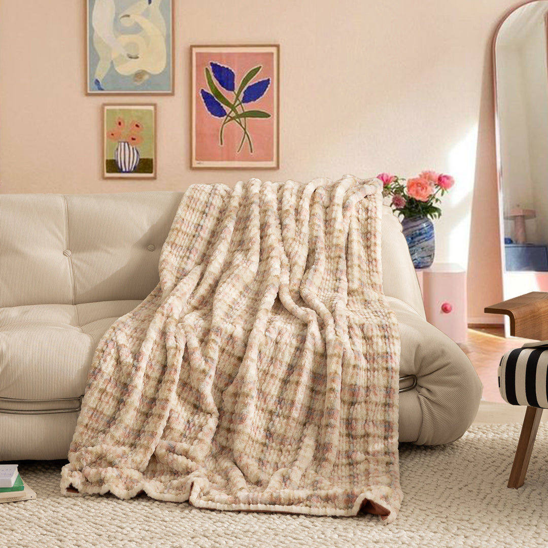 Cozy blanket made of luxurious synthetic fur with wavy texture and soft microfiber back