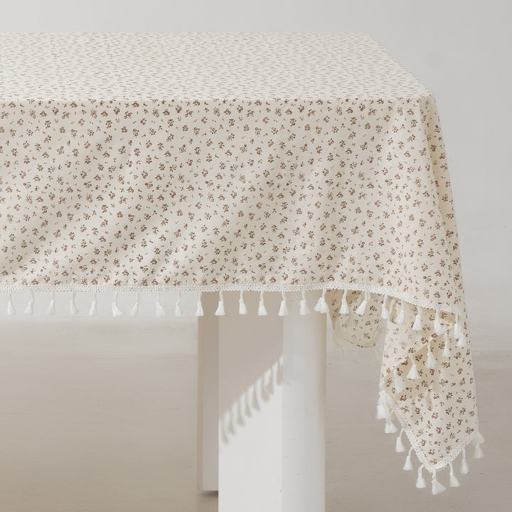 Rectangular tablecloth with floral Millefleurs print and cotton tassels
