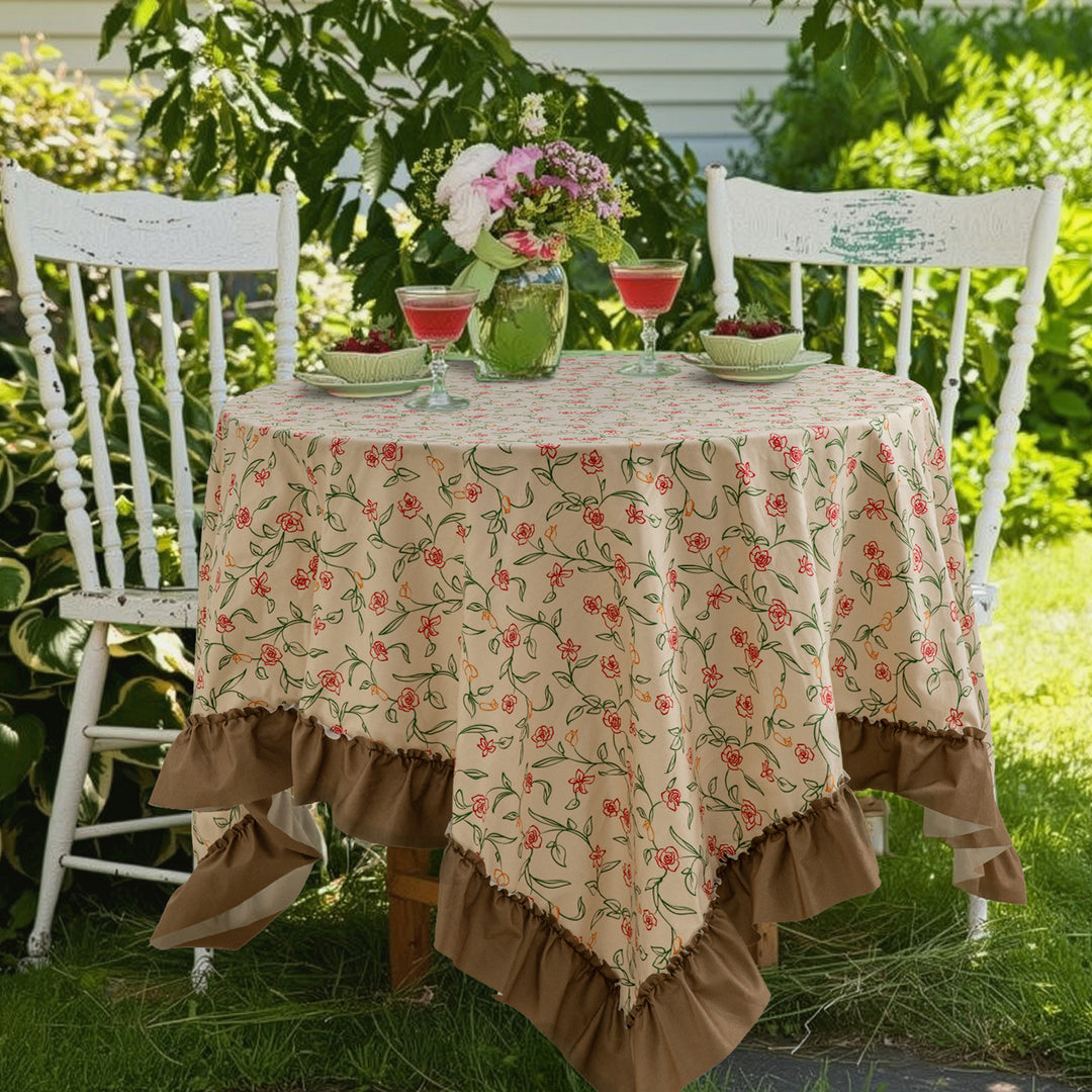 Rectangular tablecloth made of cotton blend fabric with fine floral print and gathered hem
