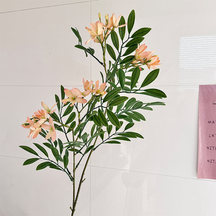 Decorative artificial flower branch with delicate flowers