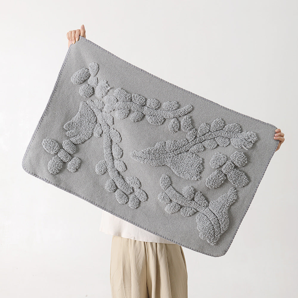 Luxurious organic cotton bath mat with relief pile structure