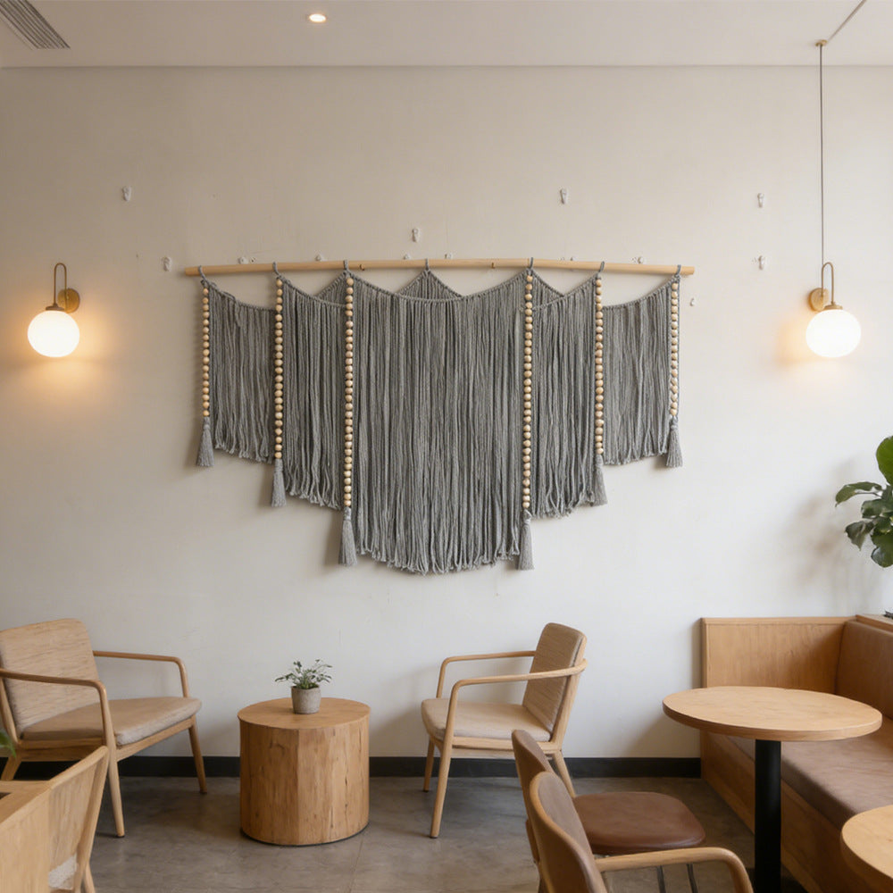 Elegant Macrame Wall Hanging with ornate fringes and leaves