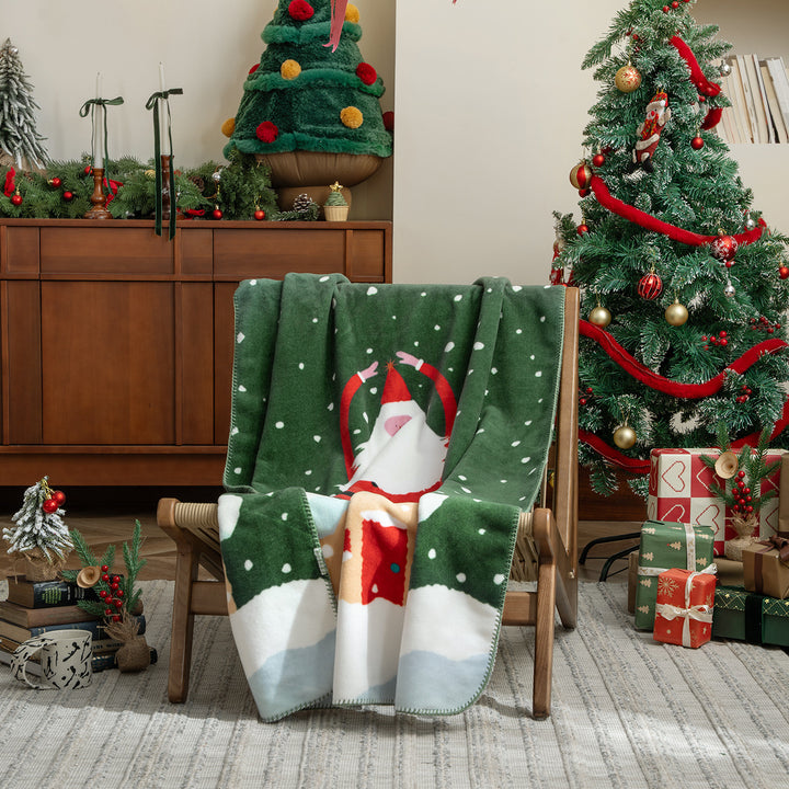 Christmas cuddle blanket with gift and gingerbread pattern