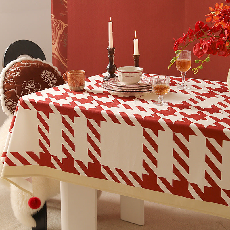 Rectangle wipeable tablecloth with diagonal checkered design and tassels