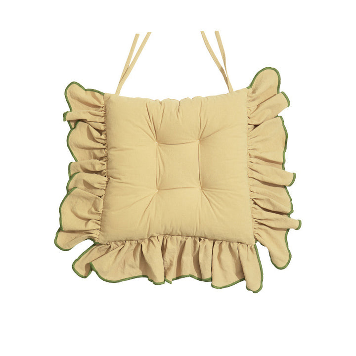 Padded chair cushion with ruffle and ties