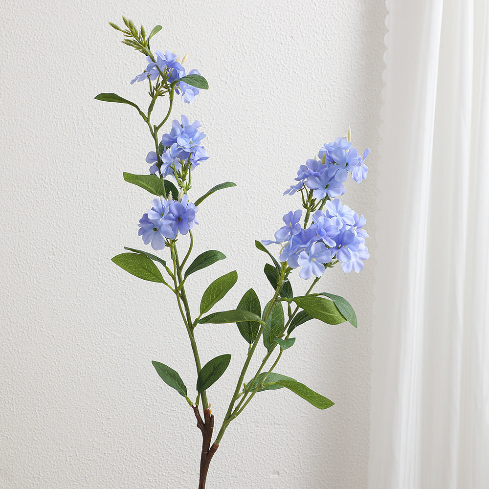 Decorative art branch with white flowers