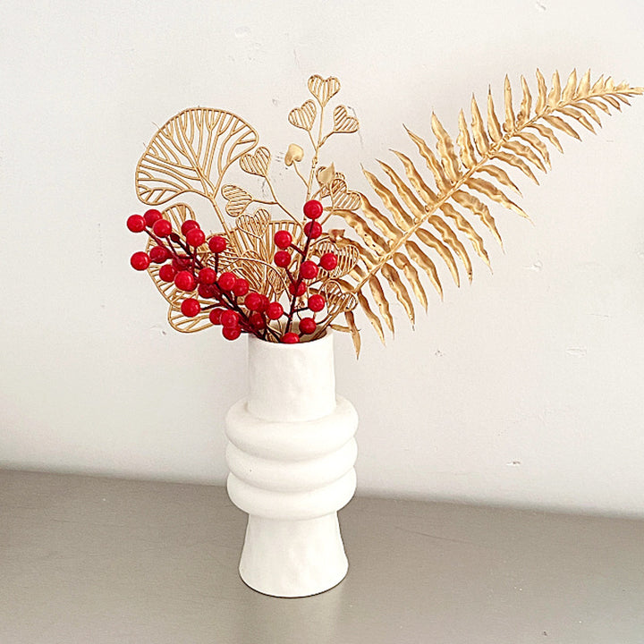 Decorative artificial flower branch with delicate details