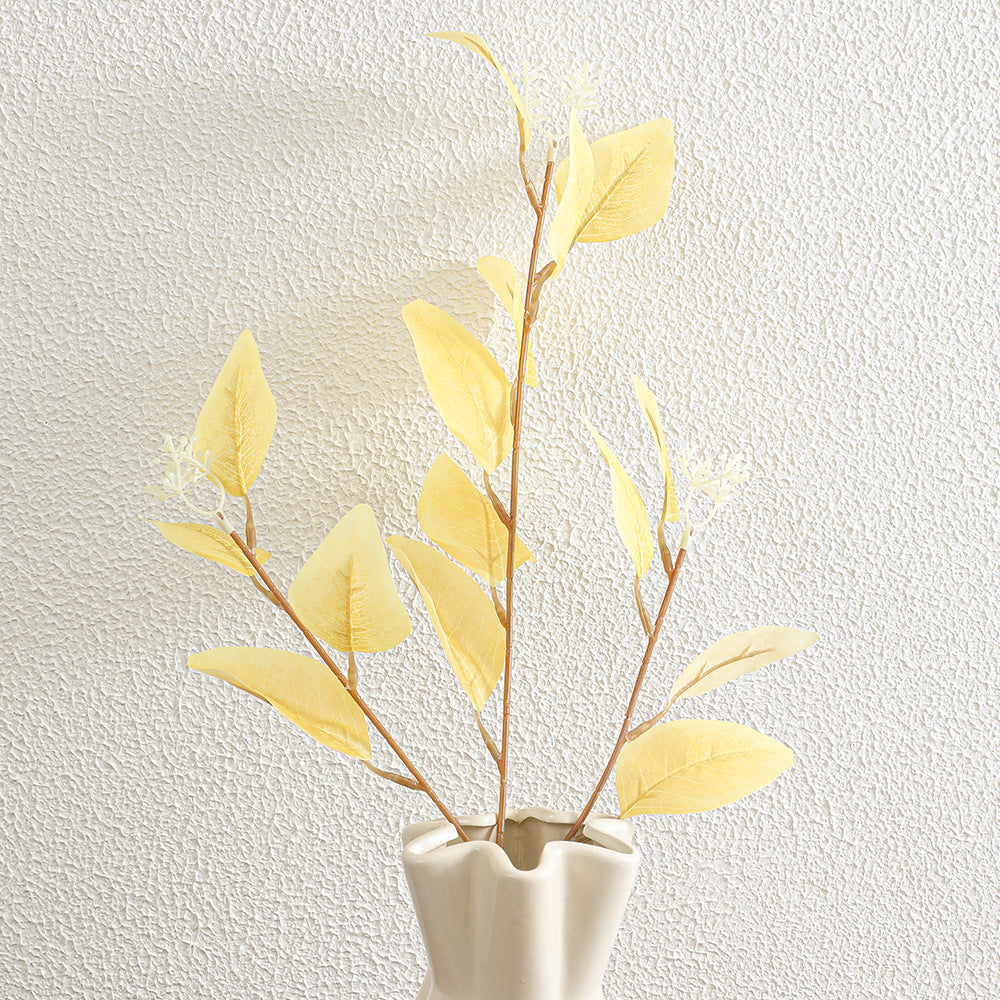 Decorative artificial flower branch with delicate leaves