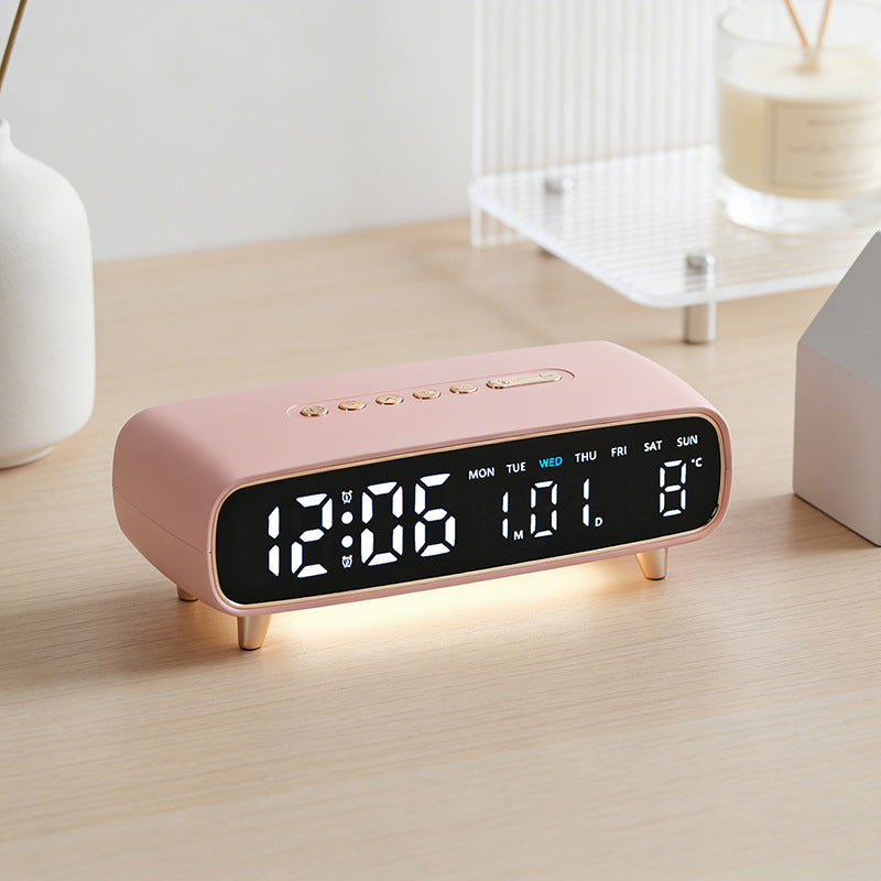 Digital radio alarm clock with temperature and date display