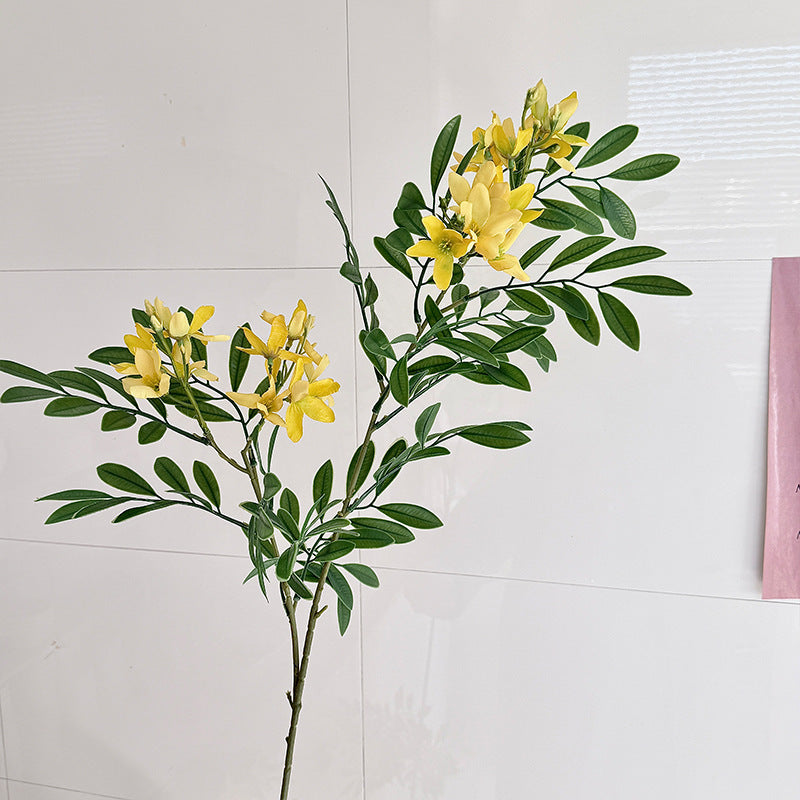 Decorative artificial flower branch with delicate flowers