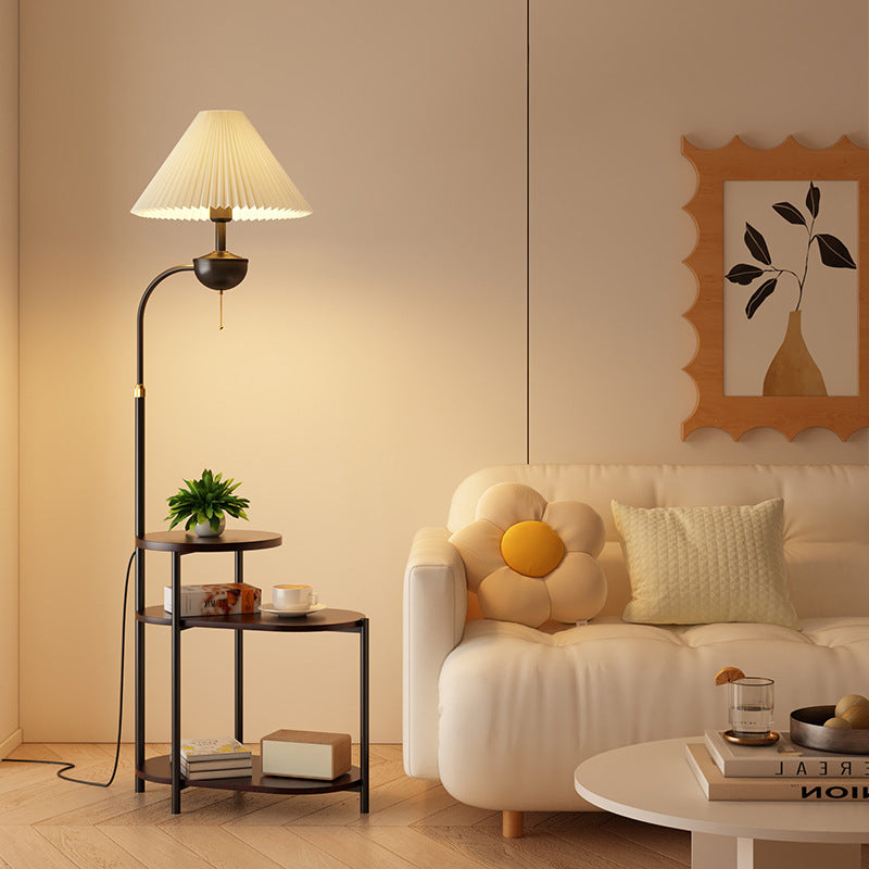 Multifunctional floor lamp with integrated side table