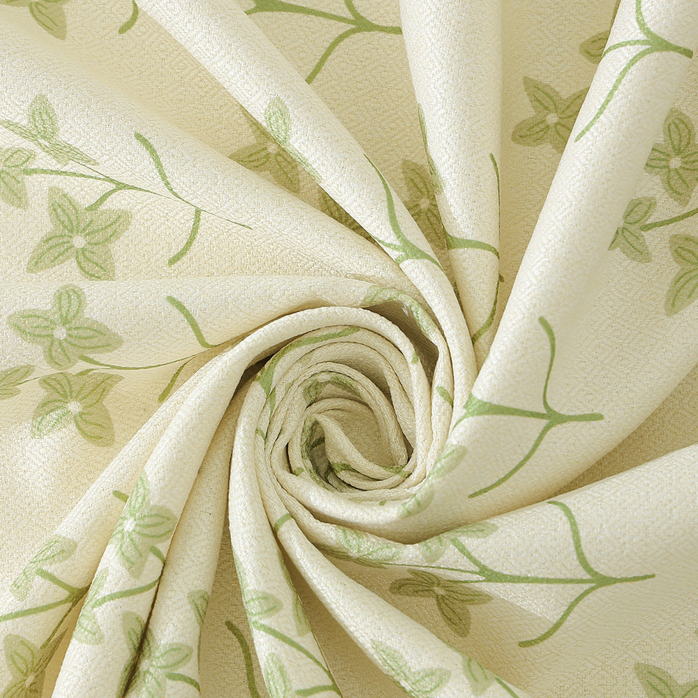 Cotton blend tablecloth with woven floral border decor and green hem