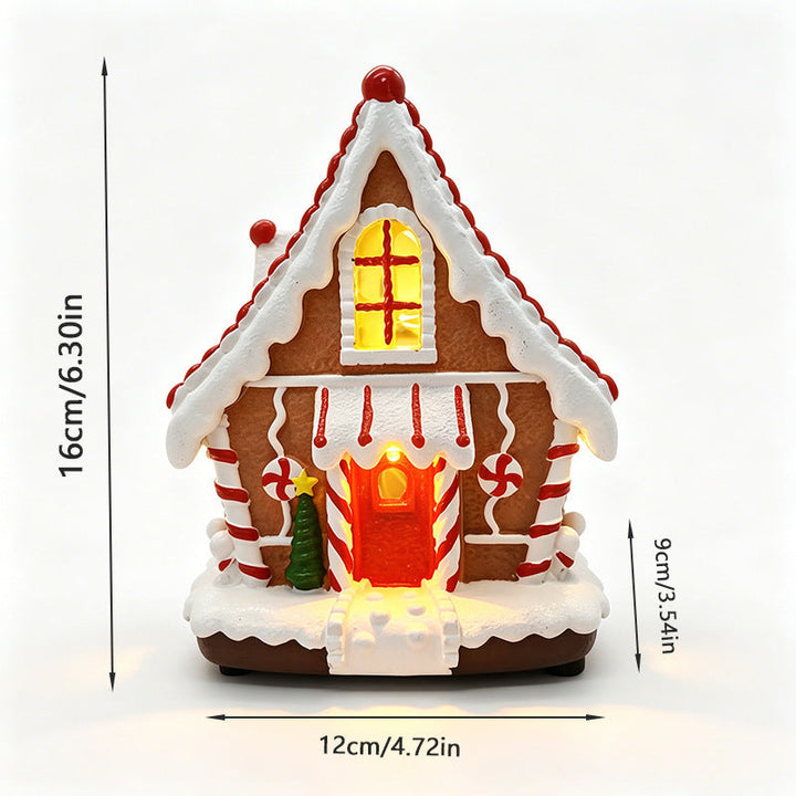 Illuminated Christmas village decoration with moving figures