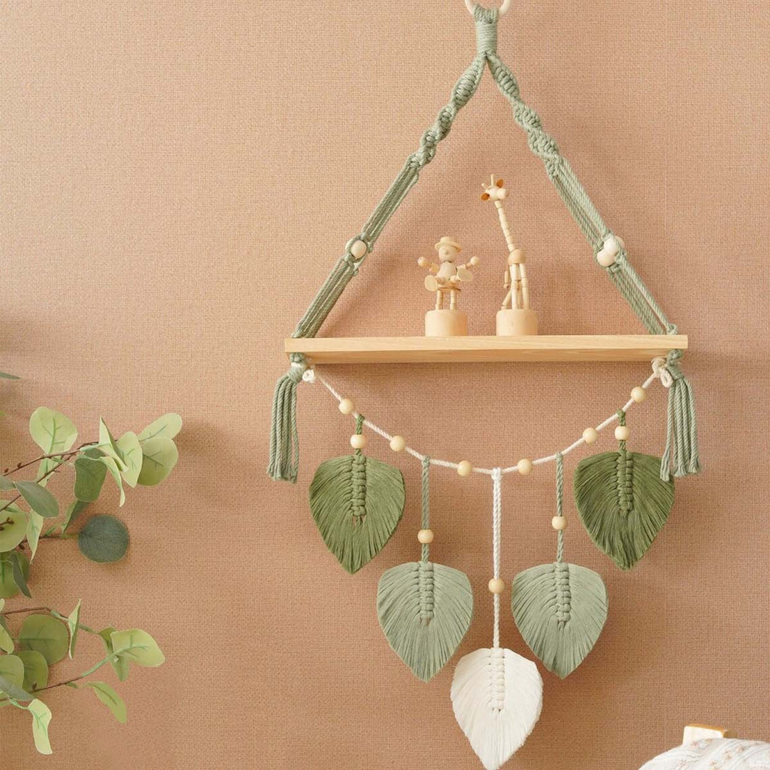 Macramé plant shelf with artistic leaf design