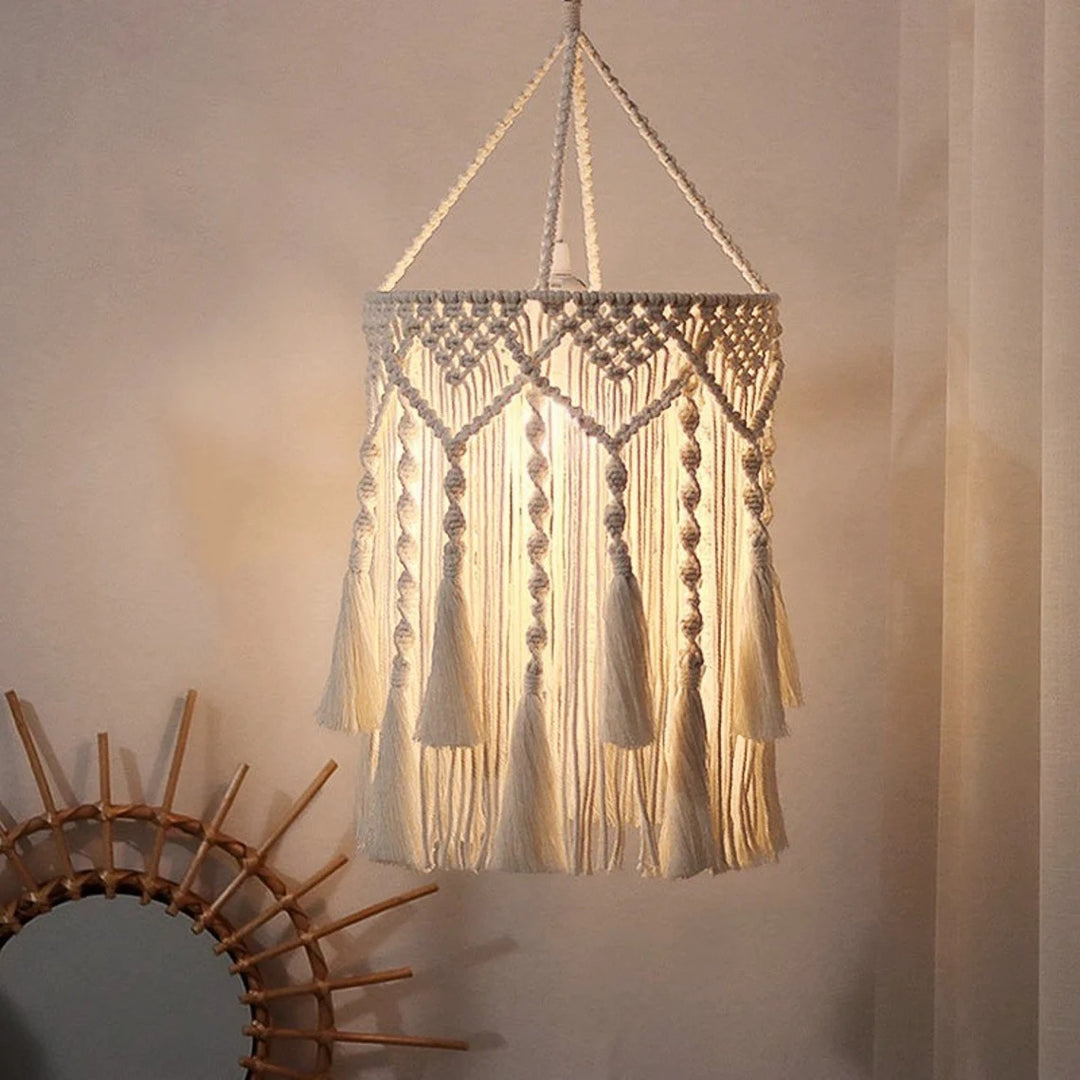 Macrame plant hanger with decorative fringes
