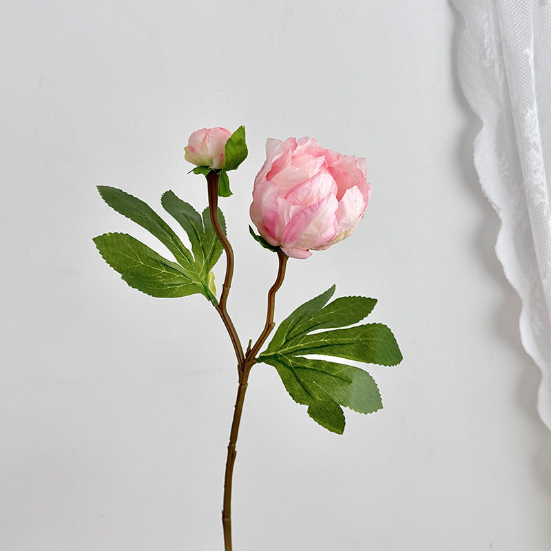 Artificial peony bouquet with delicate flowers and leaves